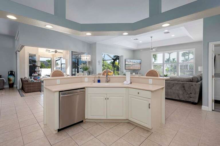 Kitchen Island with Bar Facing the Pool and Lanai