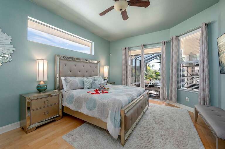 Main Bedroom with Pool Access and King Size Bed