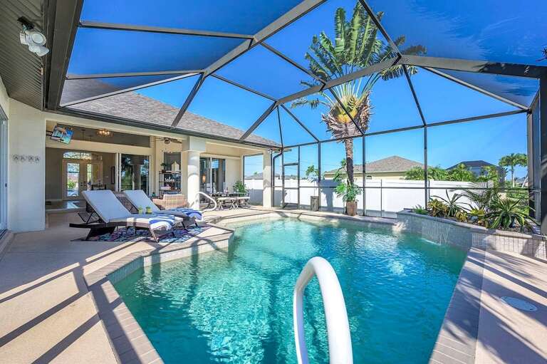 View Of the Pool Area with Lounges