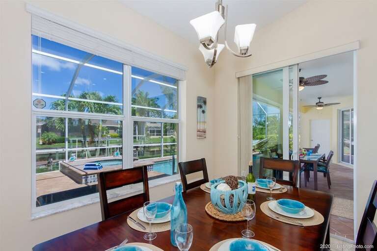 Dining Area with View of the Pool and Patio