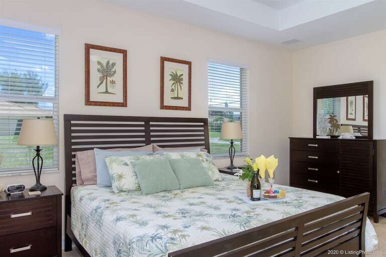 The Master Bedroom Features a King Size Bed
