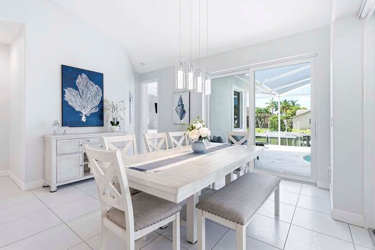 Large Dining Table with View of the Lanai and Pool
