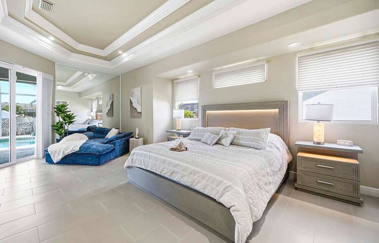 Main King Bedroom Suite with Lounge Area and Access to the Lanai