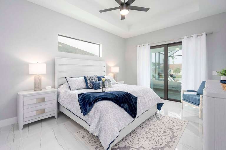 Main Bedroom with Patio Access as well as En Suite Bathroom