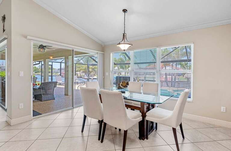 Dining Space Features Lots of Lights and Views of the Outdoors