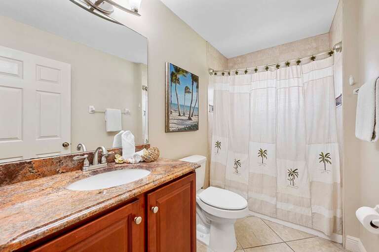 Hallway Bathroom with Sink and Tub Shower Combo