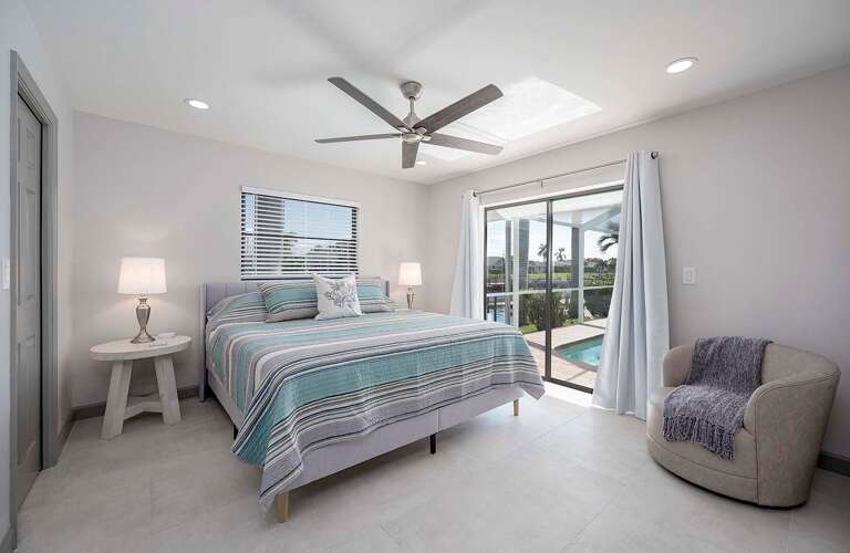 Guest King Bedroom with Access to Pool and Lanai