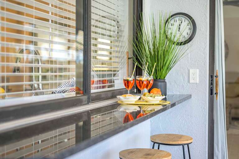 Open the Window For Some Direct Serving Access from the Kitchen to the Lanai