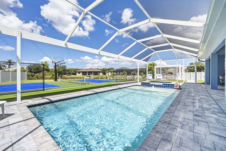 Enjoy Watching the Games from the Pool or Covered Lanai.