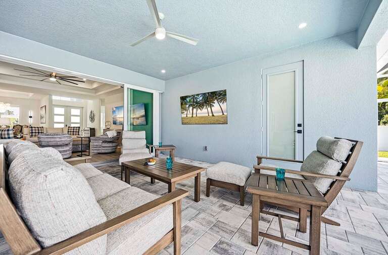 Outdoor Lounge Space with TV for those Sunday Football Games and Access to the Pool Bathroom