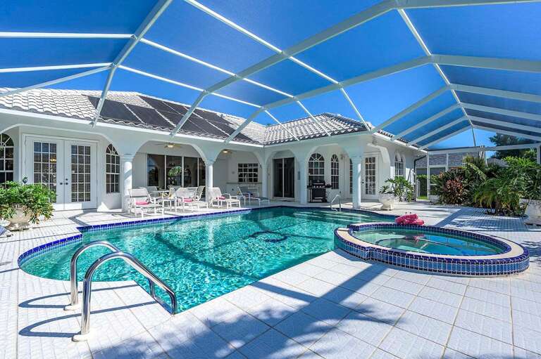 This Resort Style Pool and Hot Tub is Just Calling Your Name