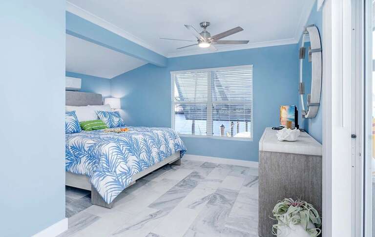 The Main Bedroom Features a King Size Bed and En-suite Bathroom