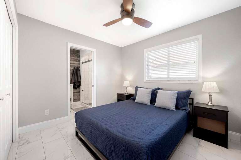 Queen Bedroom with En-Suite Bathroom and TV
