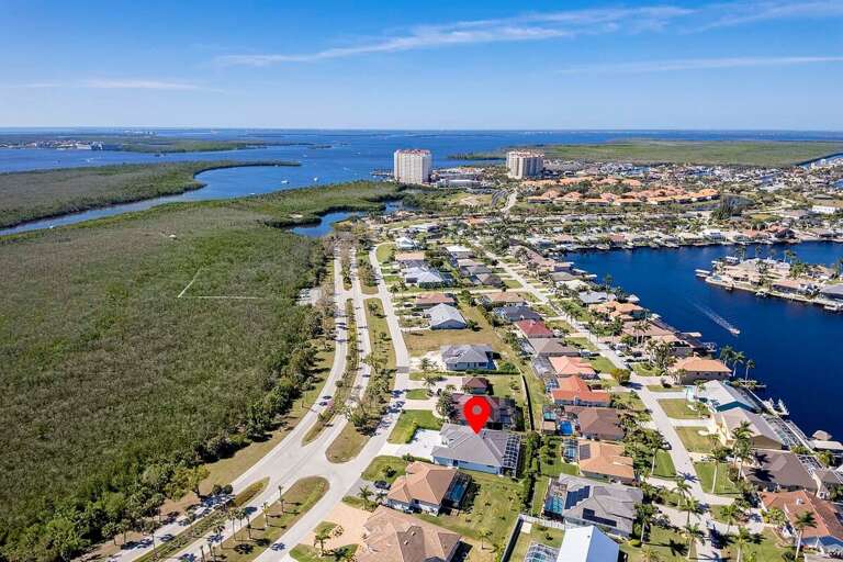 Aerial View of Villa Rosegarden Close to Tarpon Point Marina and the Westin Hotel