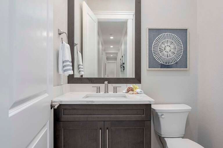Half Guest Bathroom with Access to Lanai