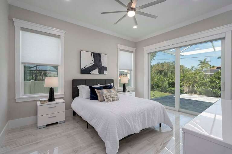 King Guest Bedroom with Garden Views and Pool Access