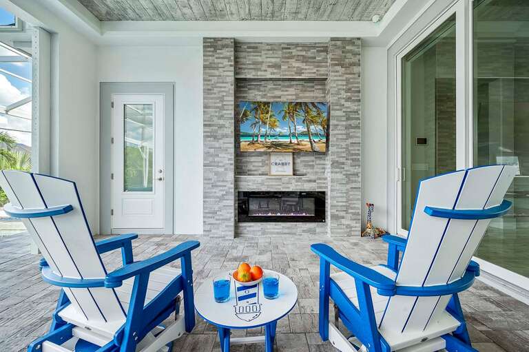 Lounge Space and Dining Space with Gas Fire Place and TV