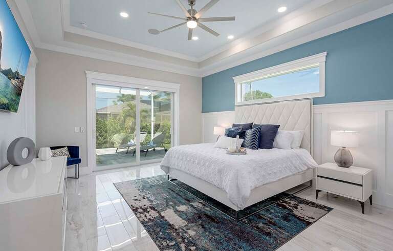 Main King Bedroom with Access to Pool and Patio