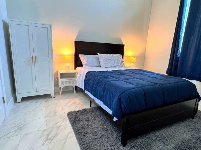 Queen Guest Bedroom with Garden View