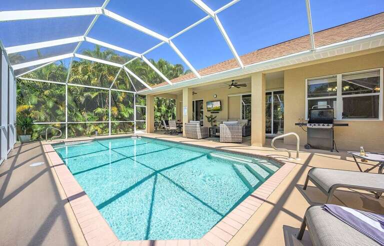 Southern Facing Pool Surrounded by Tropical Landscape