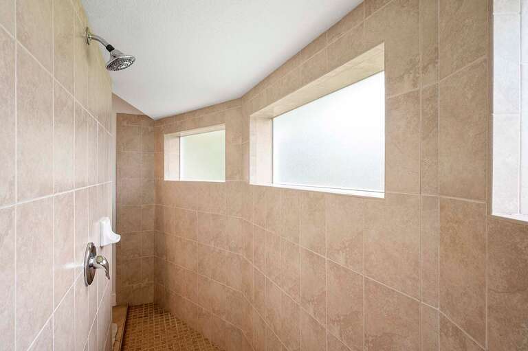 Large Wrap Around Shower in Main En-Suite Bathroom