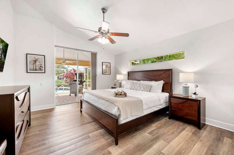 Welcome to Your Main King Bedroom Suite with Access to Lanai and Pool