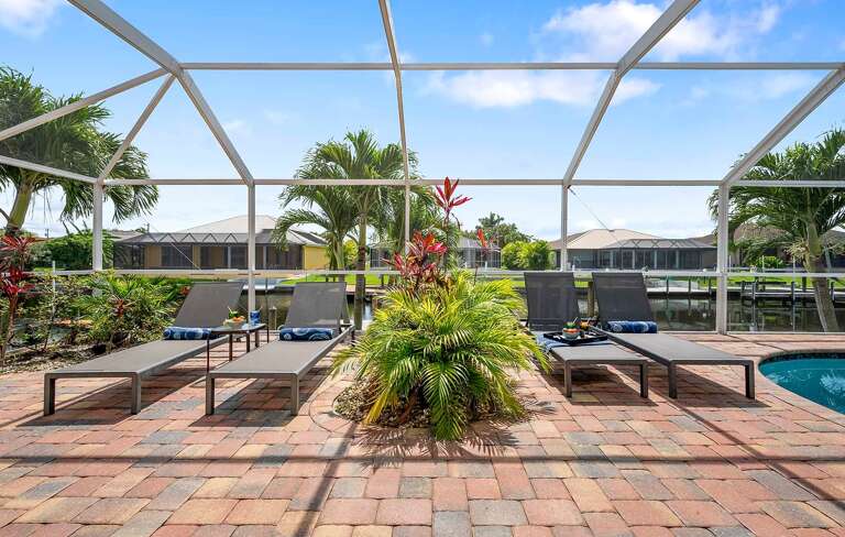 Relax and Soak Up the Sun at Sand By Me Surrounded by Tropical Landscape