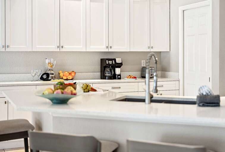 Kitchen with Open View of the Living Room and Outdoors