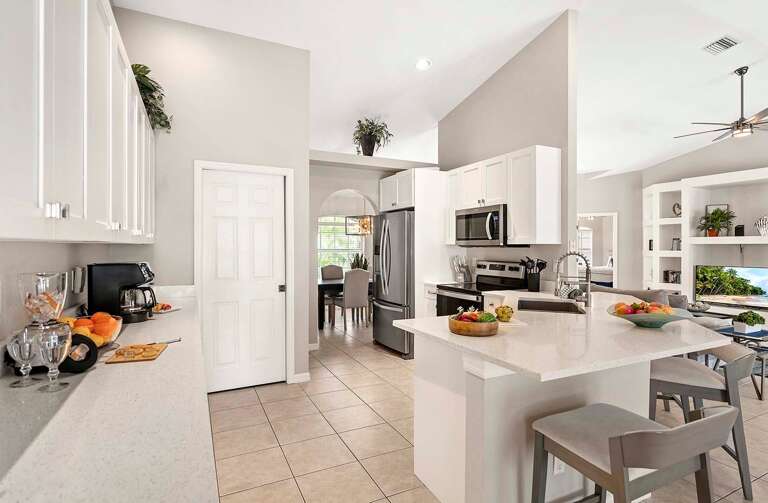 Large Kitchen with Counter Height BAr and Lots of Work Space