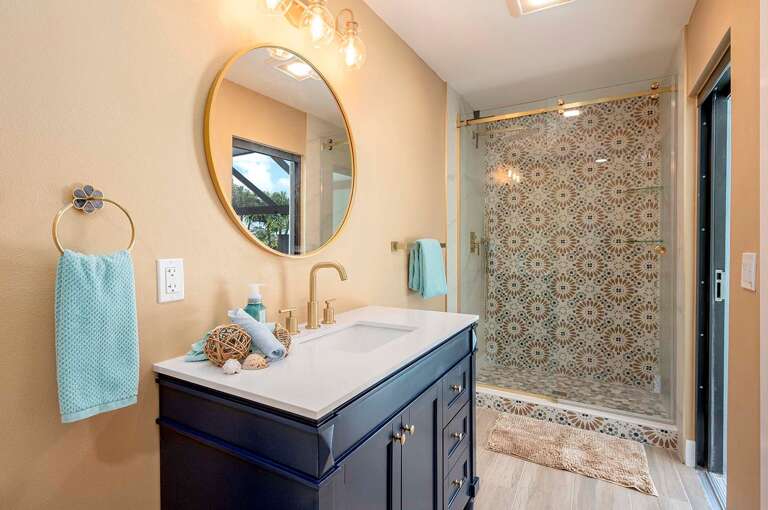 2nd Suite Bathroom with Walk in Shower and Pool Access