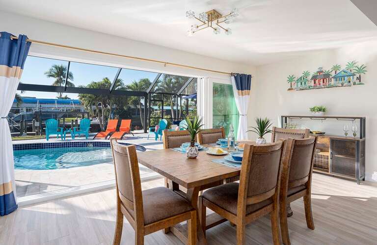 Dining Space with Amazing Pool and Canal Views