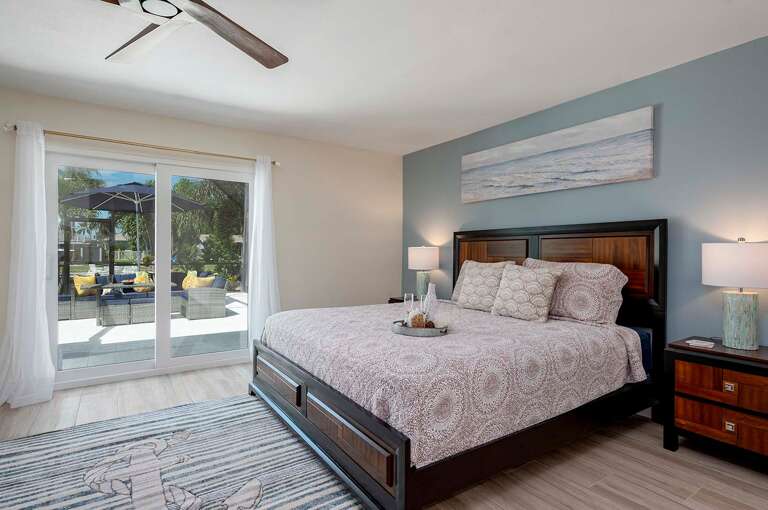 Main Bedroom with King Bed and Patio Access