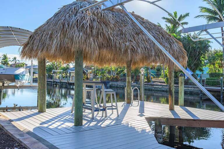 Tiki Time Sunsets with a View along the Canal.