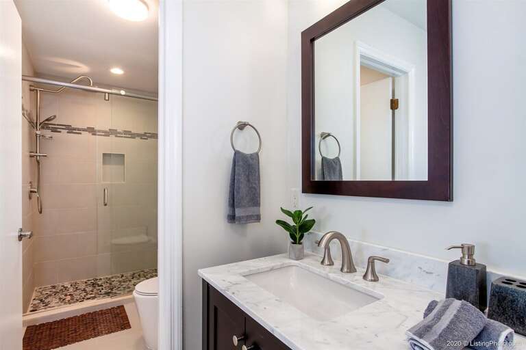 Guest Hallway Pool Bathroom with Shower and Sink