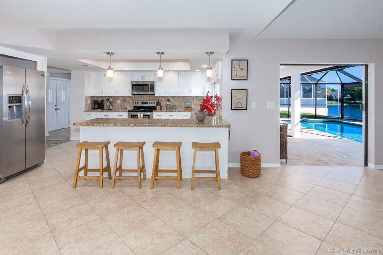 The Kitchen with Patio Views and Access to the lanai