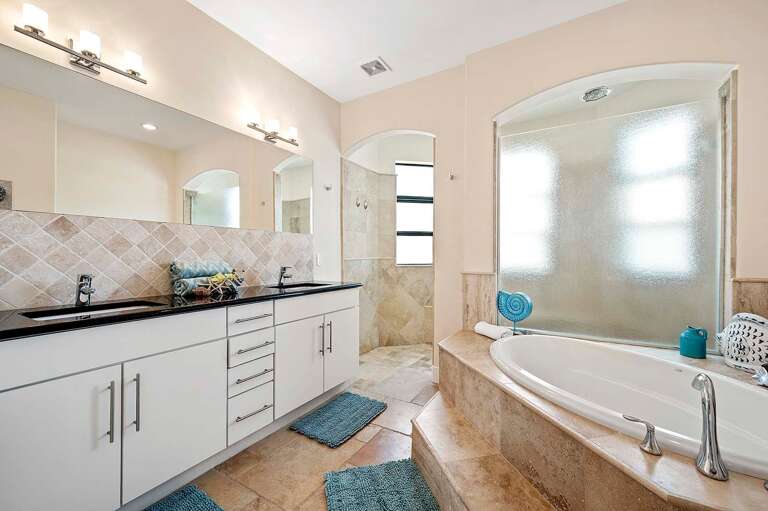 Dual Sinks, Soaking Tub and Walk in Shower for the En-Suite Bathroom