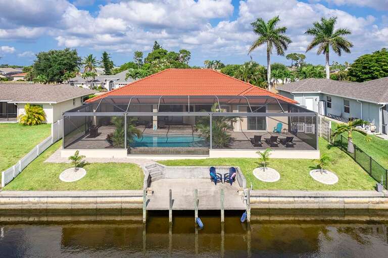 Rear Backyard Exposure With Dock and Gulf Access