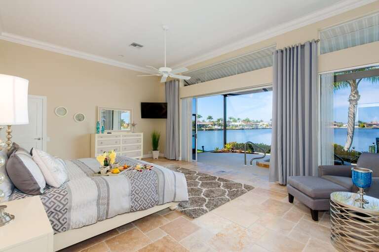 Main King Bedroom Suite with Patio Access near the Hot Tub
