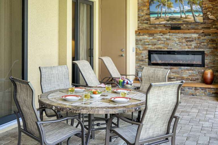 Enjoy Al Fresco Dining with a Fire Place and Some Good Entertainment