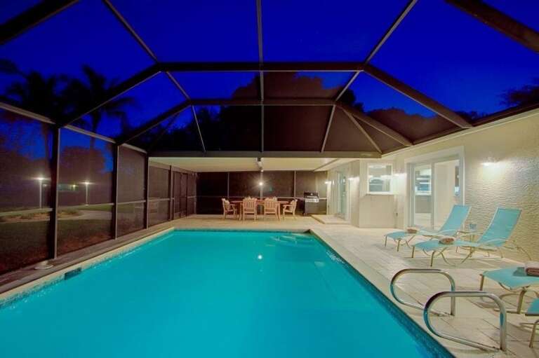 Beautifully Light Up Pool and Outdoor Entertainment Space