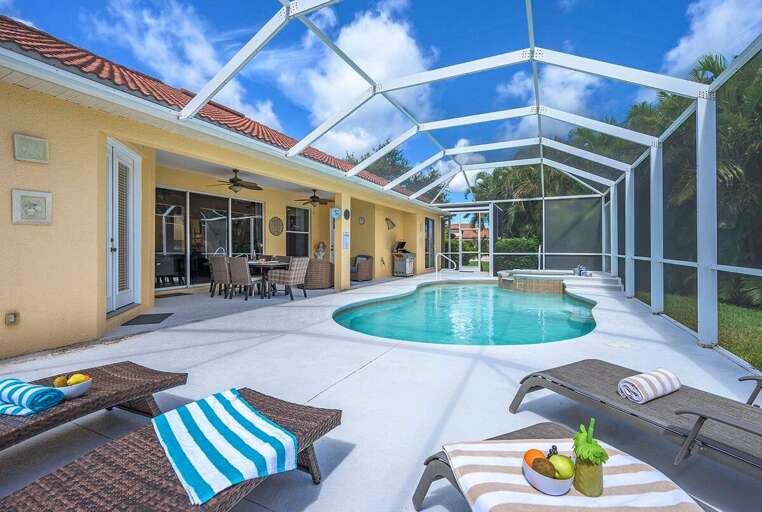 Pool Area with beautiful Garden and Canal Views