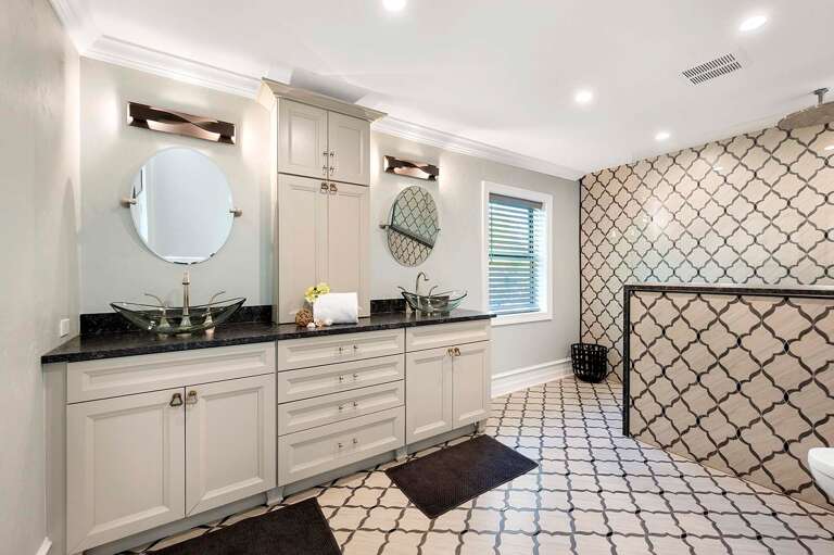 En-Suite Main Bathroom with Dual Sinks and Walk in Shower