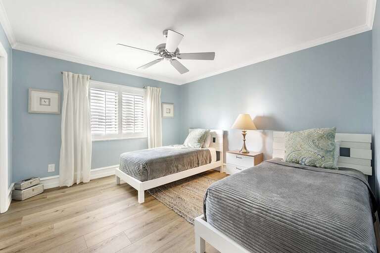 Guest Bedroom with Two Twin Beds and Garden View