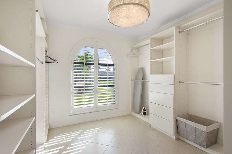 Large Walk In Closet with Plenty of Room for Your Vacation Clothes