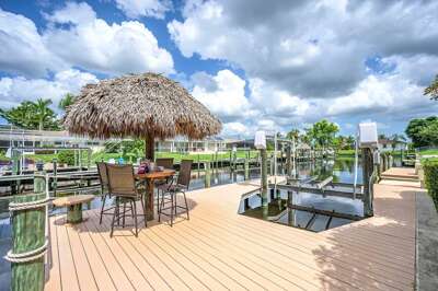 Enjoy Amazing Sunset Views from this Sweet Retreat Tiki Hut Dock