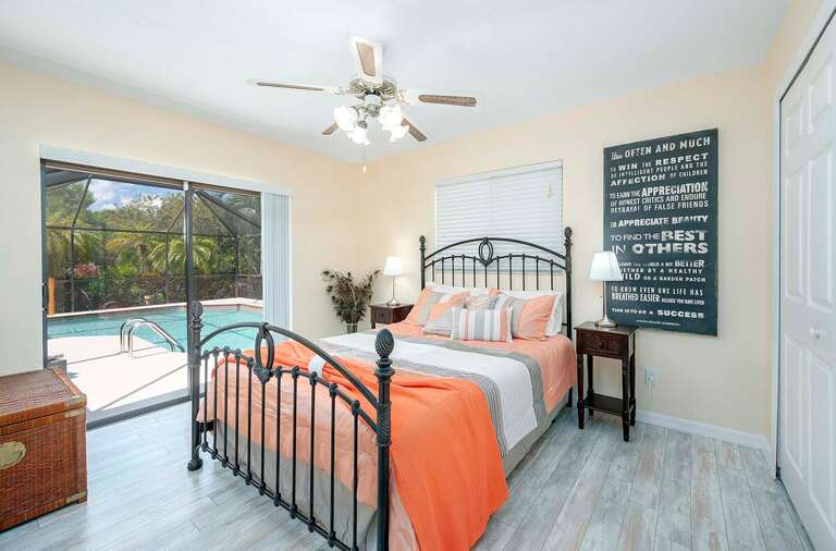 Queen Bedroom with Pool Area Access