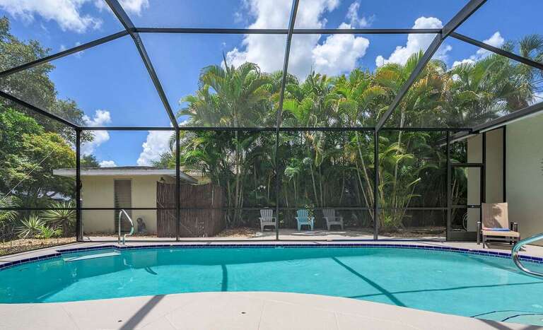 Swimming Pool Surrounded by Mature Landscaping