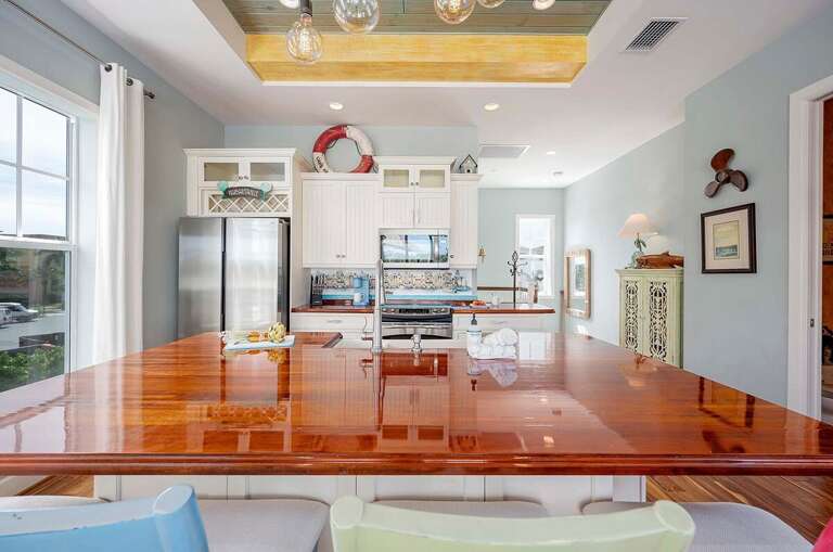 Kitchen Island Great for Additional Seating and Entertainment