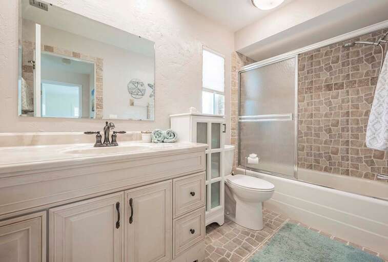 Guest Bathroom with Shower/Tub Combo and Sink