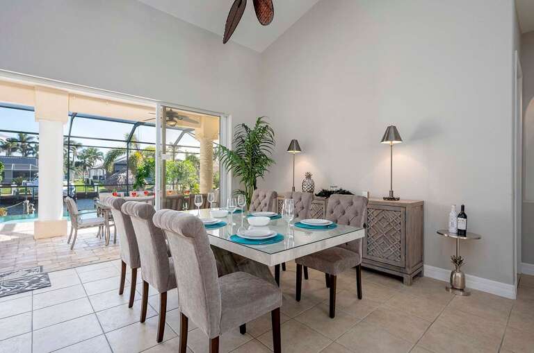 Formal Dining Space with Views of the Pool and Lanai